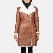 
Close-Up Detail of Notch & Leather Buttons Hardware on Women's Amie Brown Double Breasted Shearling Coat