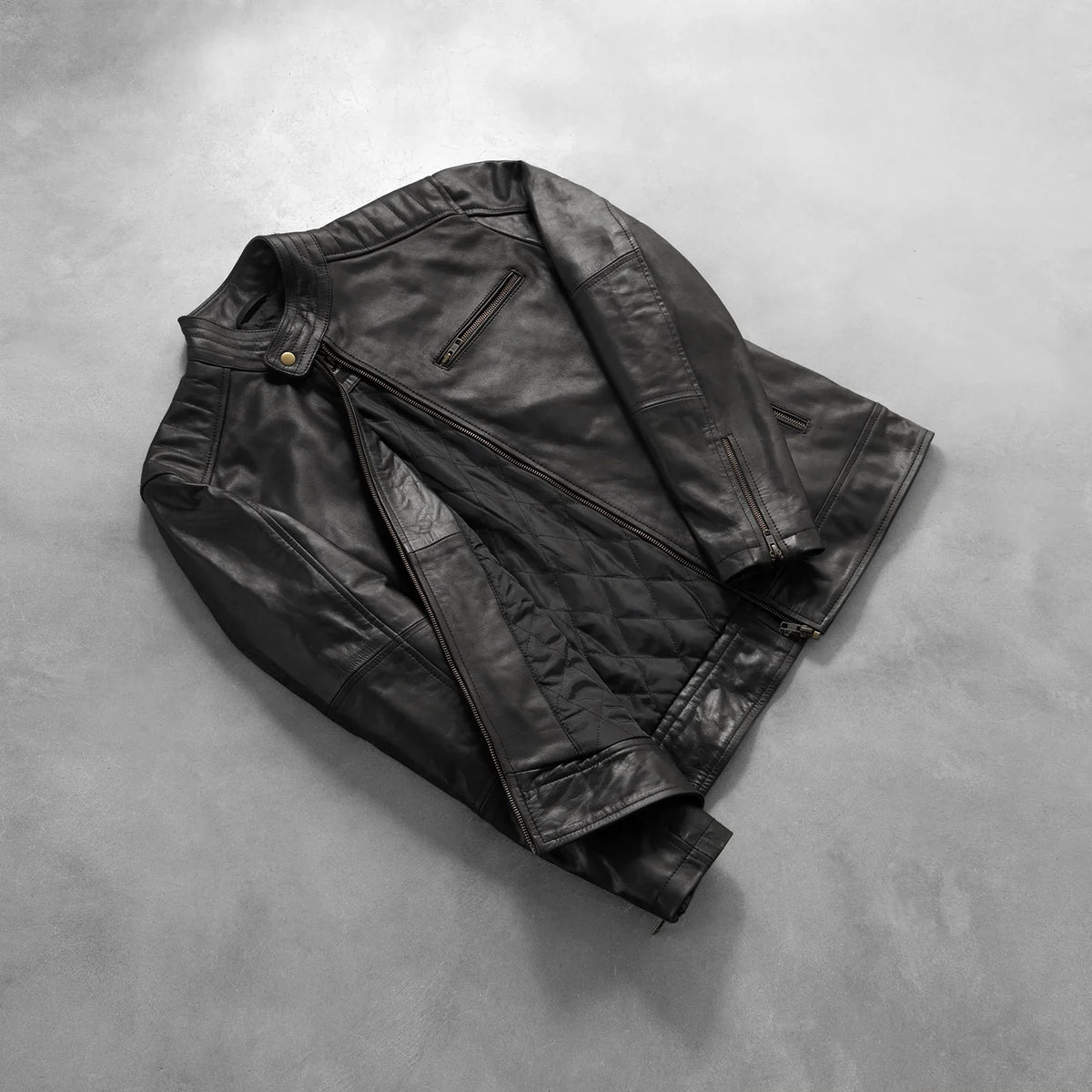 
Styled Fit Perspective of Men's Dean Black Leather Biker Jacket on Model - Natural Daylight Drape
