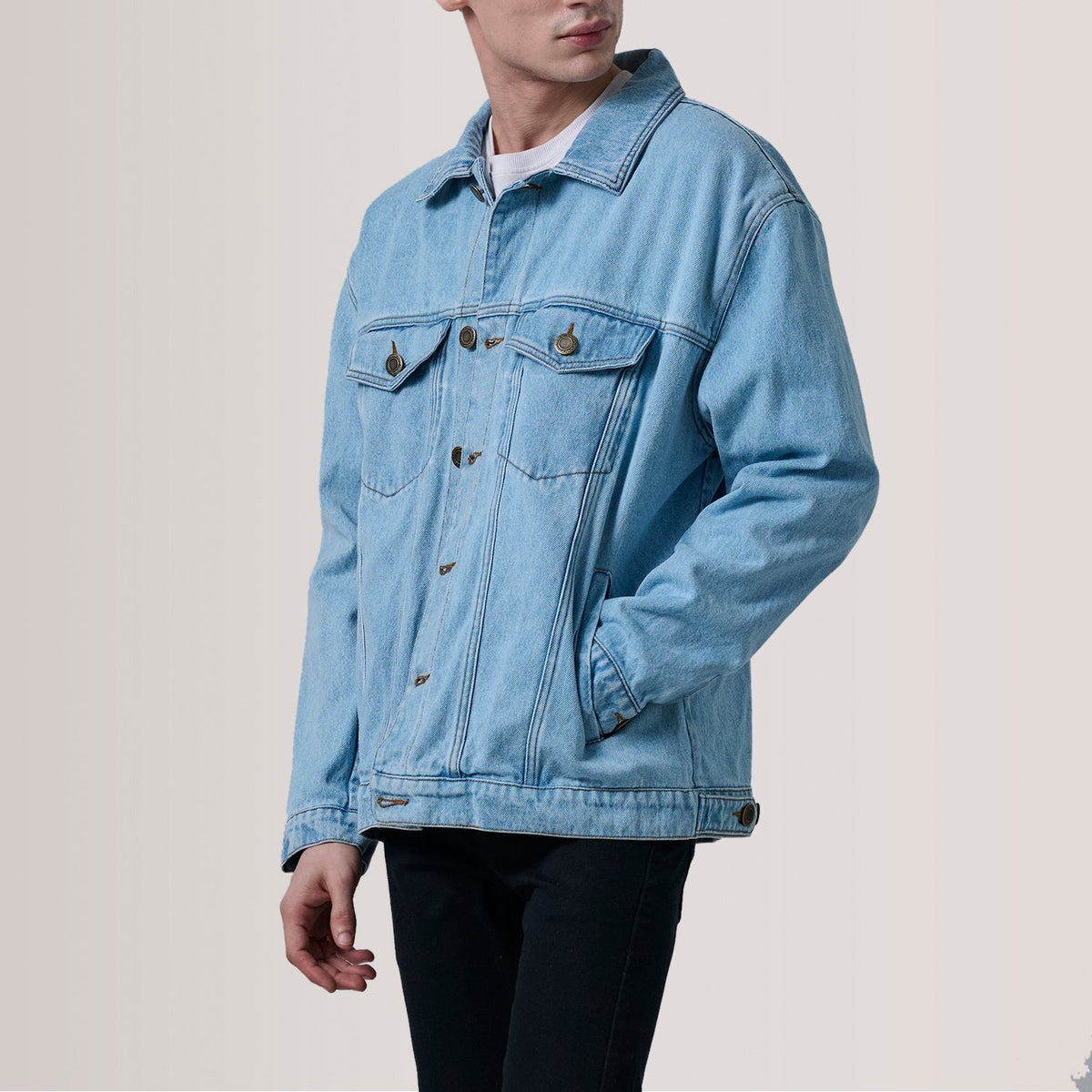 
Eddie Light Blue Oversized Denim Trucker Jacket For Men - Lateral Side Profile View Showing Sleeve Cut & Athletic Taper Fit