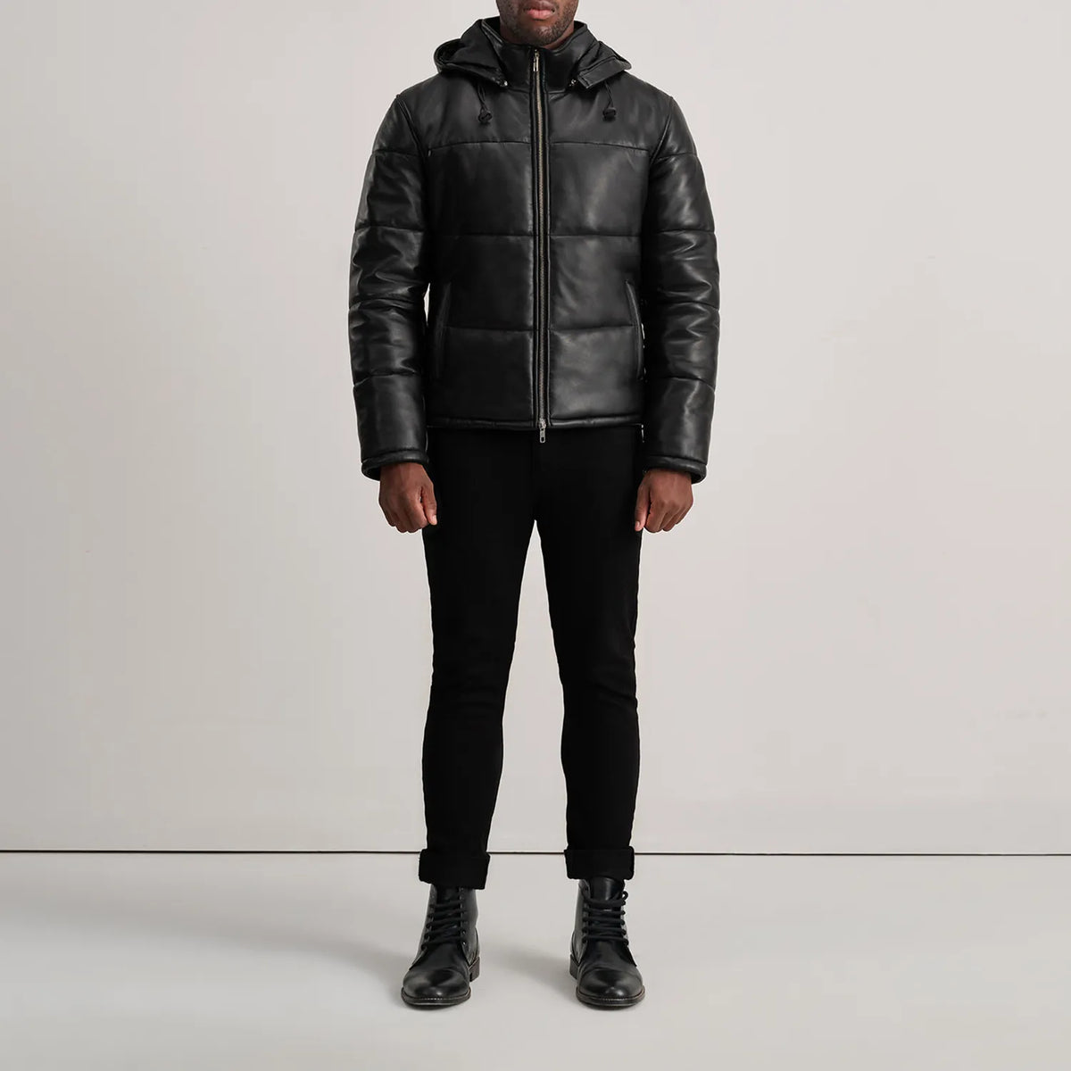
Gordon Tan Hooded Leather Puffer Jacket - Lateral Side Profile View Showing Sleeve Cut & Athletic Taper Fit