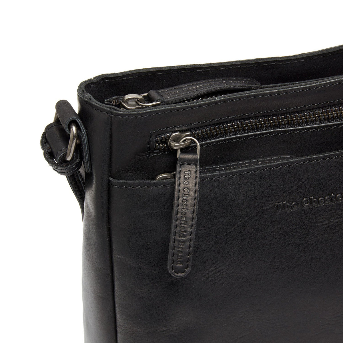 
Solid Antique Brass Hardware & Heavy-Duty Dual Zipper Detail on Mumbai Full-Grain Leather Crossbody Bag