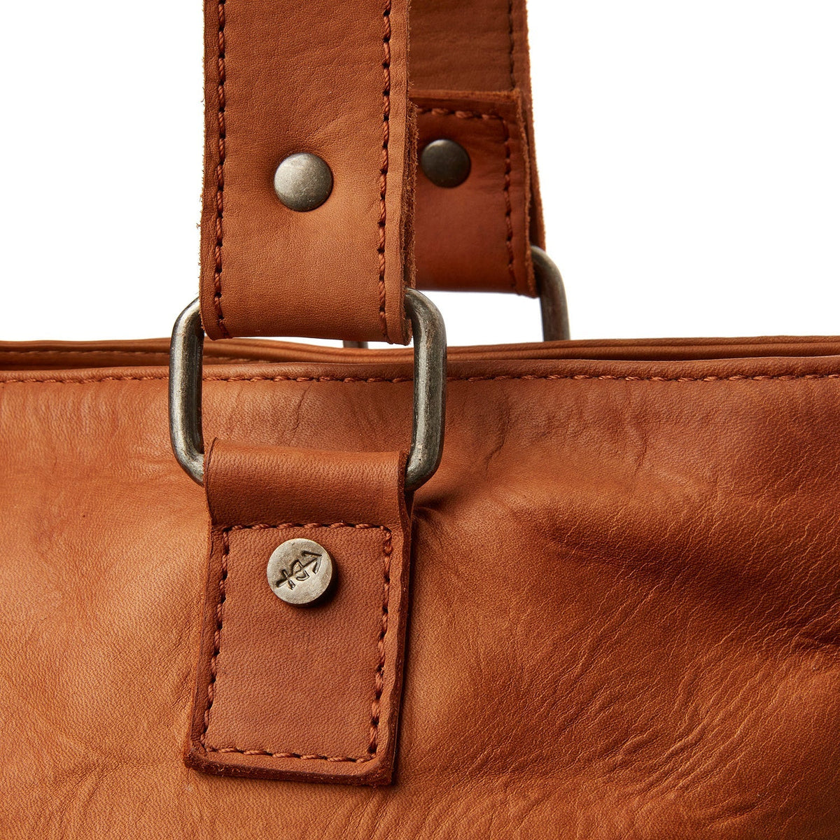 
100% Full-Grain Wax Pull-Up 100% Full-Grain Leather Grain Texture & Handcrafted Patina Detail