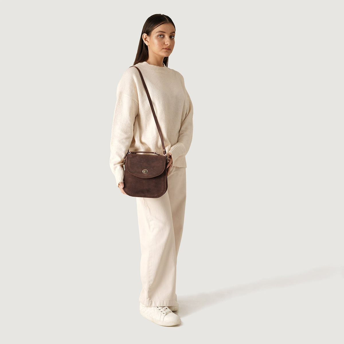 
Distressed Brown Full-Grain leather Bag - Rear Perspective Showing Reinforced Leather Straps & Stitching